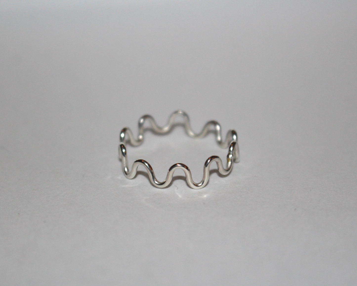 Curvy Ring, available in silver plated, sterling silver, and tarnish resistant brass