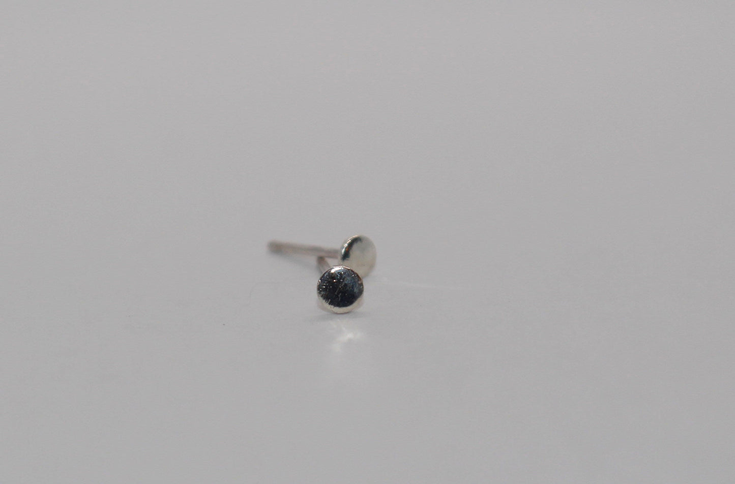 Tiny Dot Stud Earrings available in 14k Gold Fill and Sterling Silver